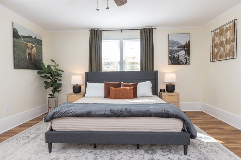 Bottom Floor Unit Bedroom #2 with King Bed, En-Suite Bathroom, 55 inch adjustable ROKU TV, Sound Machine & Blackout Curtains.