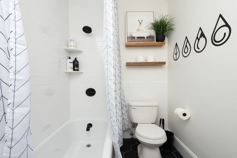 Full Bathroom with Tub/Shower Combo and Full Sized Washer & Dryer