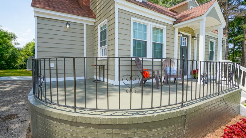 Cozy Front Porch seating area to enjoy your morning coffee