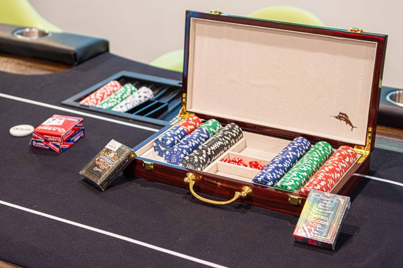 Entire Lower Level is the Game Room - complete with 8-Person Poker Table, Air Hockey, Ping Pong, Foosball, Bubble Hockey, 5,000+ Game Arcade Machine, 55-inch TV, and retractable sliding doors to still be one with nature.