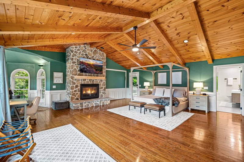 Expansive Master Bedroom with King Bed, Gas Fireplace, 65 Inch Smart TV, Sound Machine and Luxury En-Suite Bathroom
