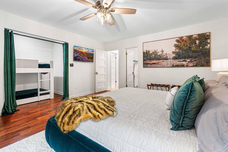 Family Suite with King Bed, 42-inch TV, En-Suite Bath with Triple Vanity, Shower/Tub Combo with wand and Twin-XL Bunk Beds for the little ones that aren't big enough to sleep in the downstairs