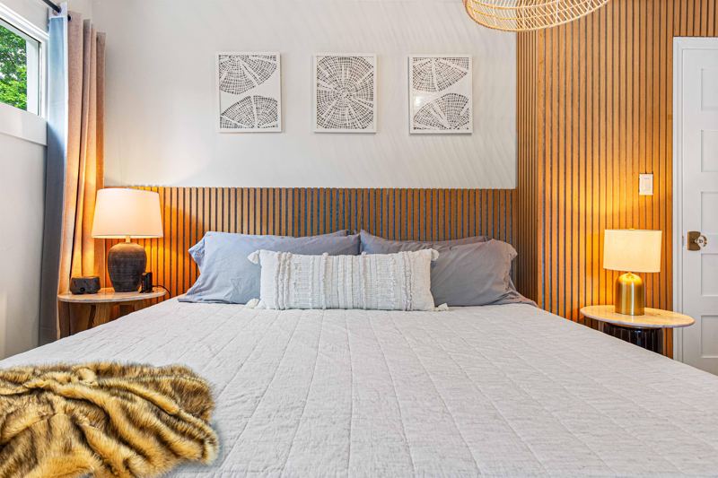 Upper-Level Bedroom #2 with King Bed, Double Closet, 55-inch Smart TV, Blackout Curtains, Sound Machine and Dresser.