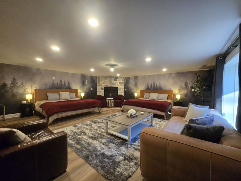 7th Bedrrom with its own fireplace and two king beds