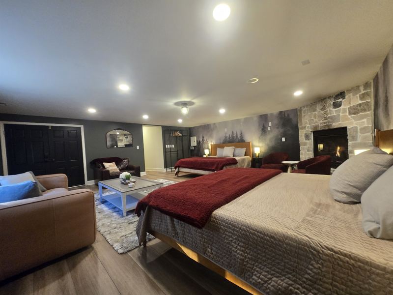 7th Bedrrom with its own fireplace and two king beds