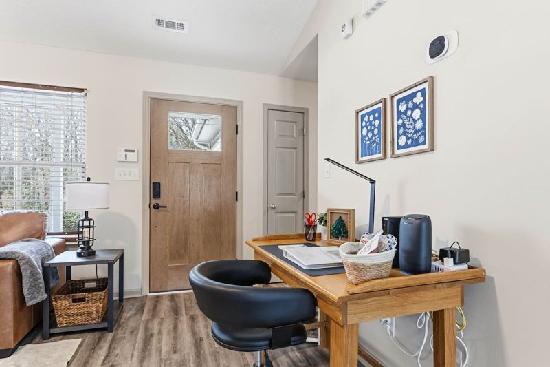 Living Room with 65" Smart TV, dedicated workspace, cards, board games and cozy seating!
