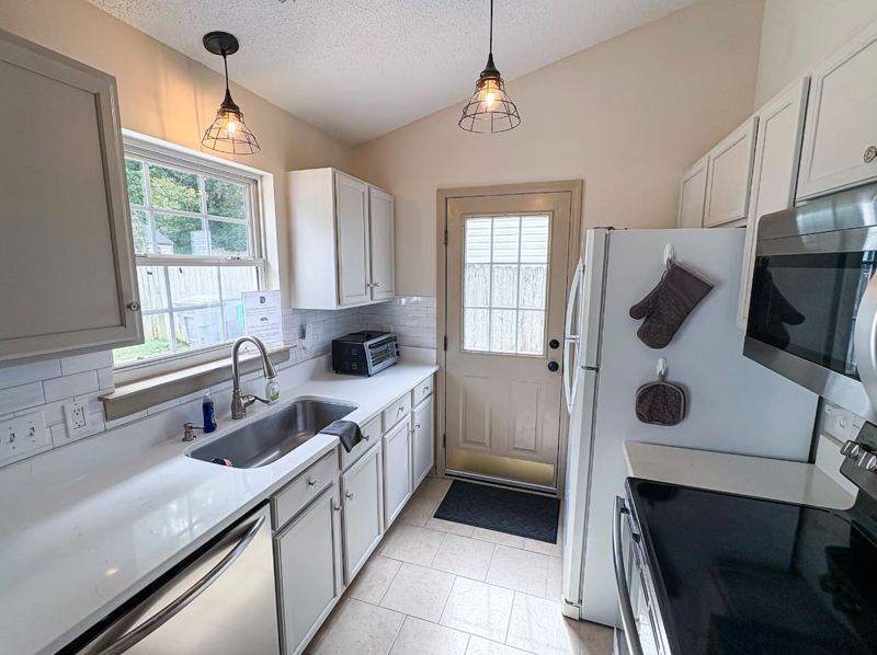 Fully stocked Kitchen with natural light