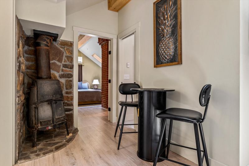 The Penthouse: Exposed Clay Brick Fireplace (not operational).