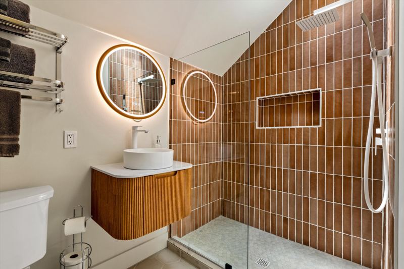 The Penthouse: Rainfall shower, ceiling skylight and provided shampoo/conditioner/body wash.