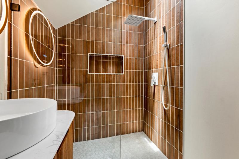 The Penthouse: Rainfall shower, ceiling skylight and provided shampoo/conditioner/body wash.