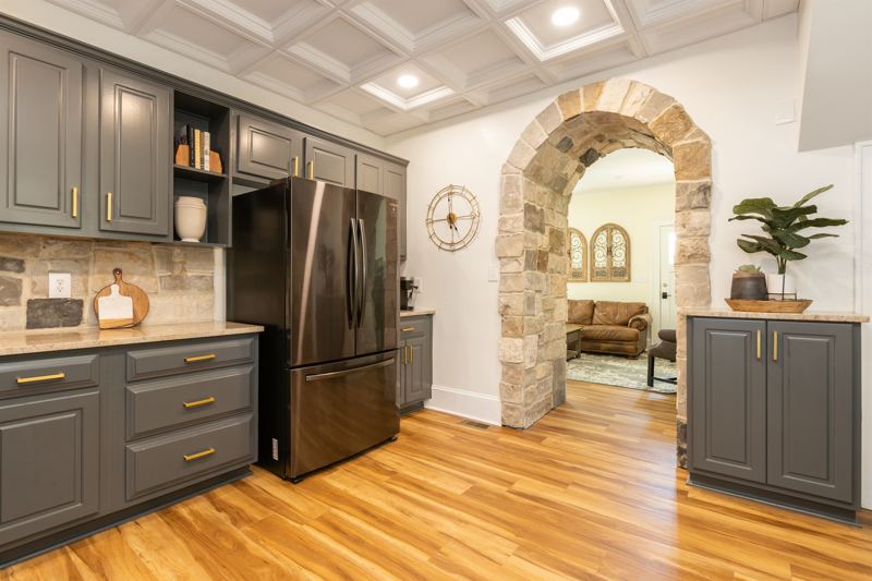 Bottom Floor Unit - Grand Jade Stone Archway into the Living Room