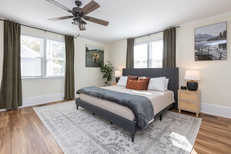 Bottom Floor Unit Bedroom #2 with King Bed, En-Suite Bathroom, 55 inch adjustable ROKU TV, Sound Machine & Blackout Curtains