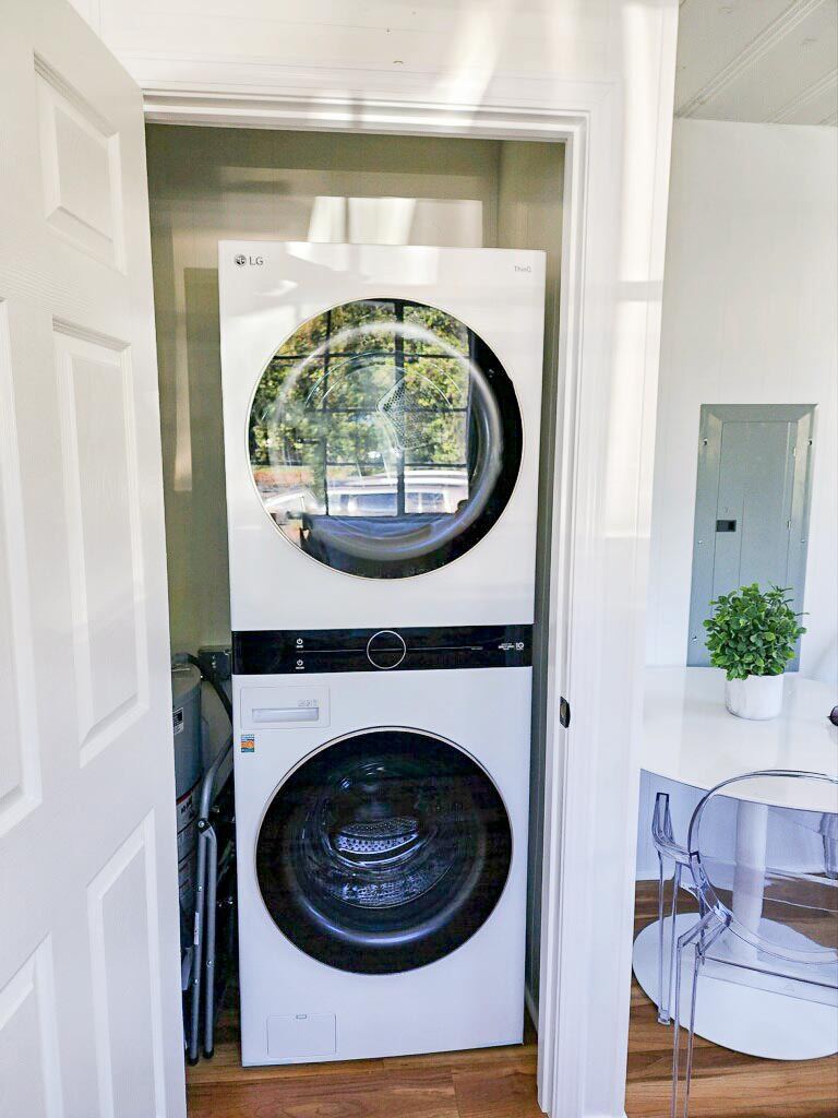 Bottom Floor Unit Full size Washer and Dryer with liquid detergent provided