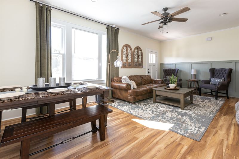 Bottom Floor Unit - Open Concept Living Room & Dining Area with 55 inch ROKU TV.