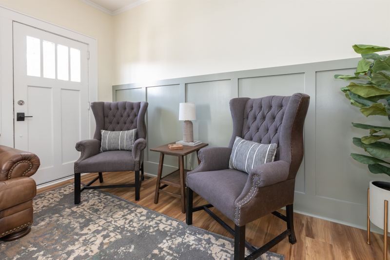 Bottom Floor Unit - High-Back sitting chairs in the Living Room