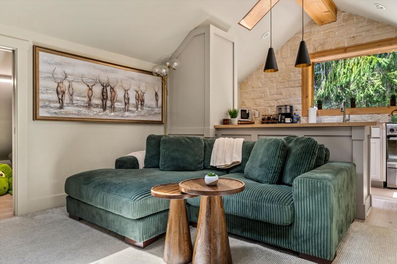 Cozy Living Room with 55-inch Smart TV, Fireplace, and bistro table.