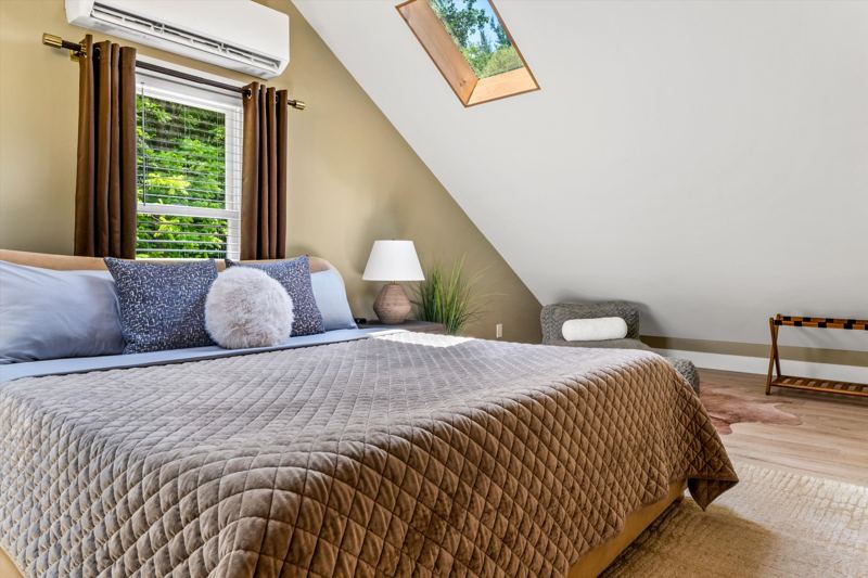 Master Bedroom with King Bed, 42-inch Smart TV, Fireplace, sound machine, blackout curtains and cozy reading chair