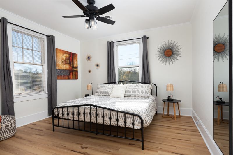 Main House Top Floor Unit Bedroom #1 with King Bed, 55-inch ROKU TV, Sound Machine, Full Length Mirror & Blackout Curtains.
