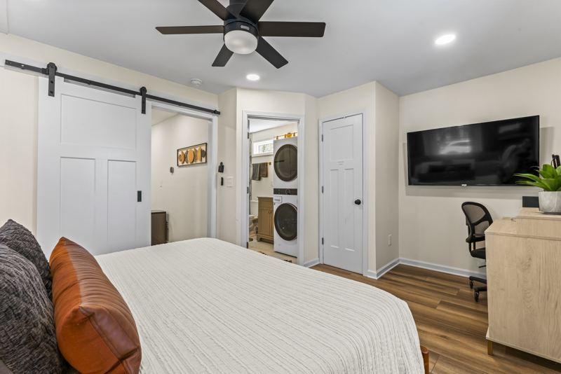 Back 1 Bed/1 Bath Unit Bedroom with King Bed, large En-Suite Bathroom, Desk with monitor, Sound Machine & Blackout Curtains